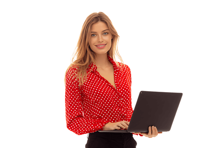 Smiling businesswoman holding laptop, red polka dot shirt