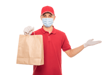 Delivery service worker in red uniform, mask and gloves holding a paper bag.