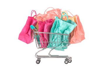 Shopping cart filled with colorful shopping bags.