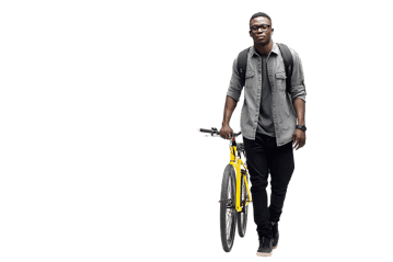 Man walking with his bicycle promoting eco friendly urban transport.