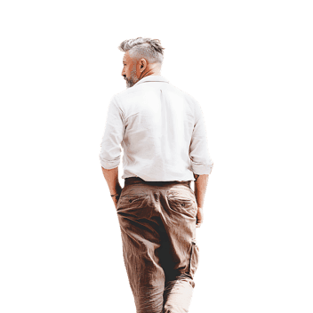 Stylish mature man with gray hair walking away, seen from the back.