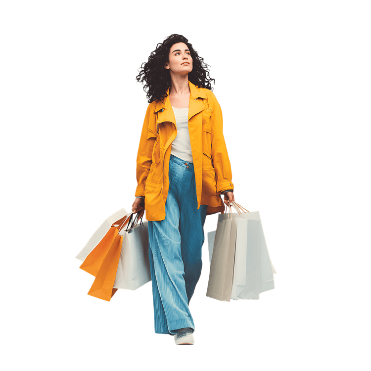 Woman enjoys shopping, carrying bags with joy.