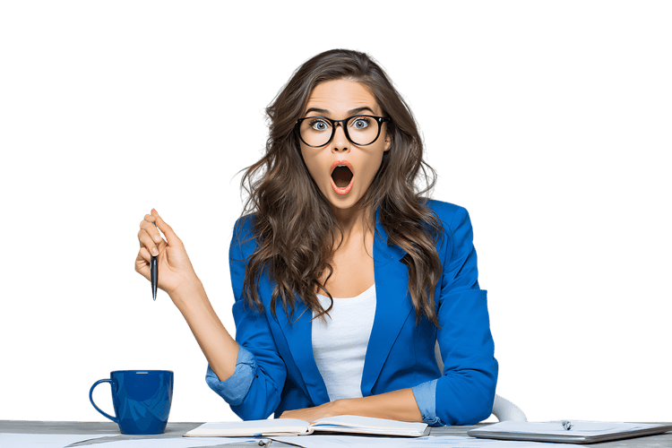 Surprised businesswoman at her desk