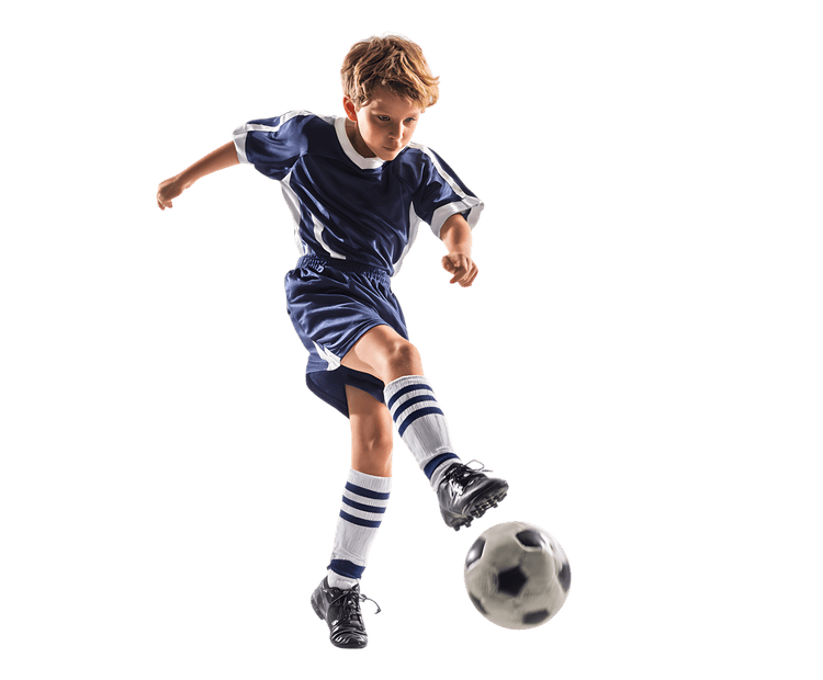 Boy kicking soccer ball. Sport, fitness, active lifestyle concept.