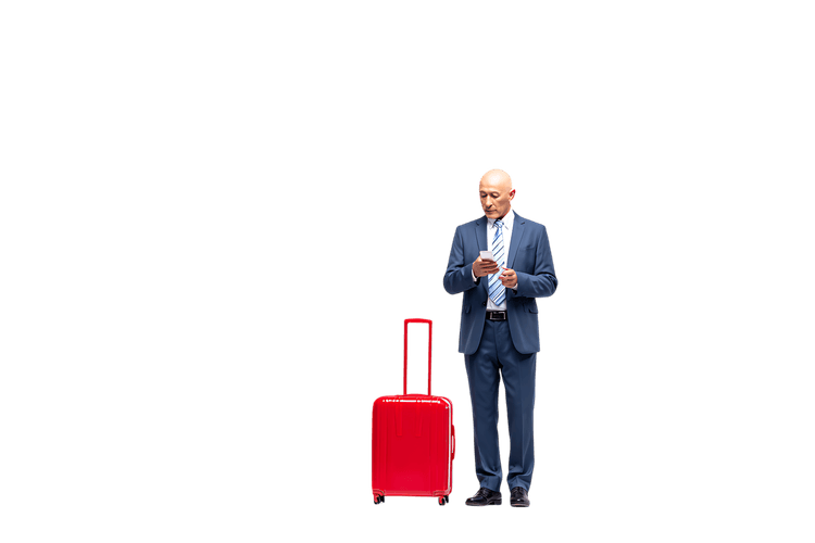 Businessman ready for travel, holding a red suitcase.