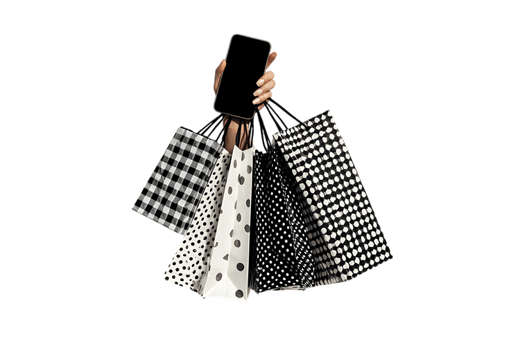 Hand holding shopping bags and smartphone. Online shopping concept.