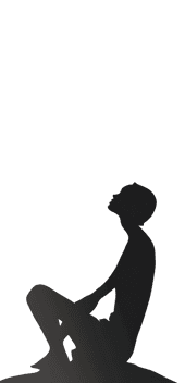 Silhouette of a person sitting alone